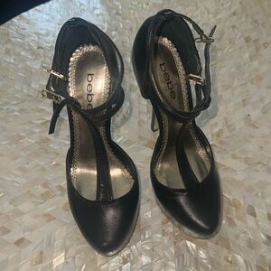BRAND NEW BEBE HEELS IN BLACK